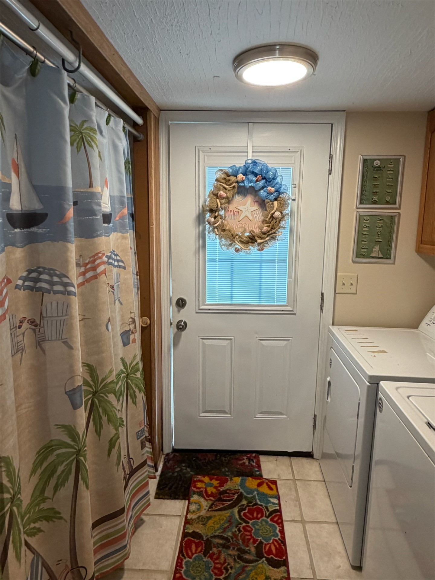 85045 Lonnie Crews Road Fernandina Beach, FL 32034 - Photo 21 of 28 a bathroom with a sink a mirror and a shower