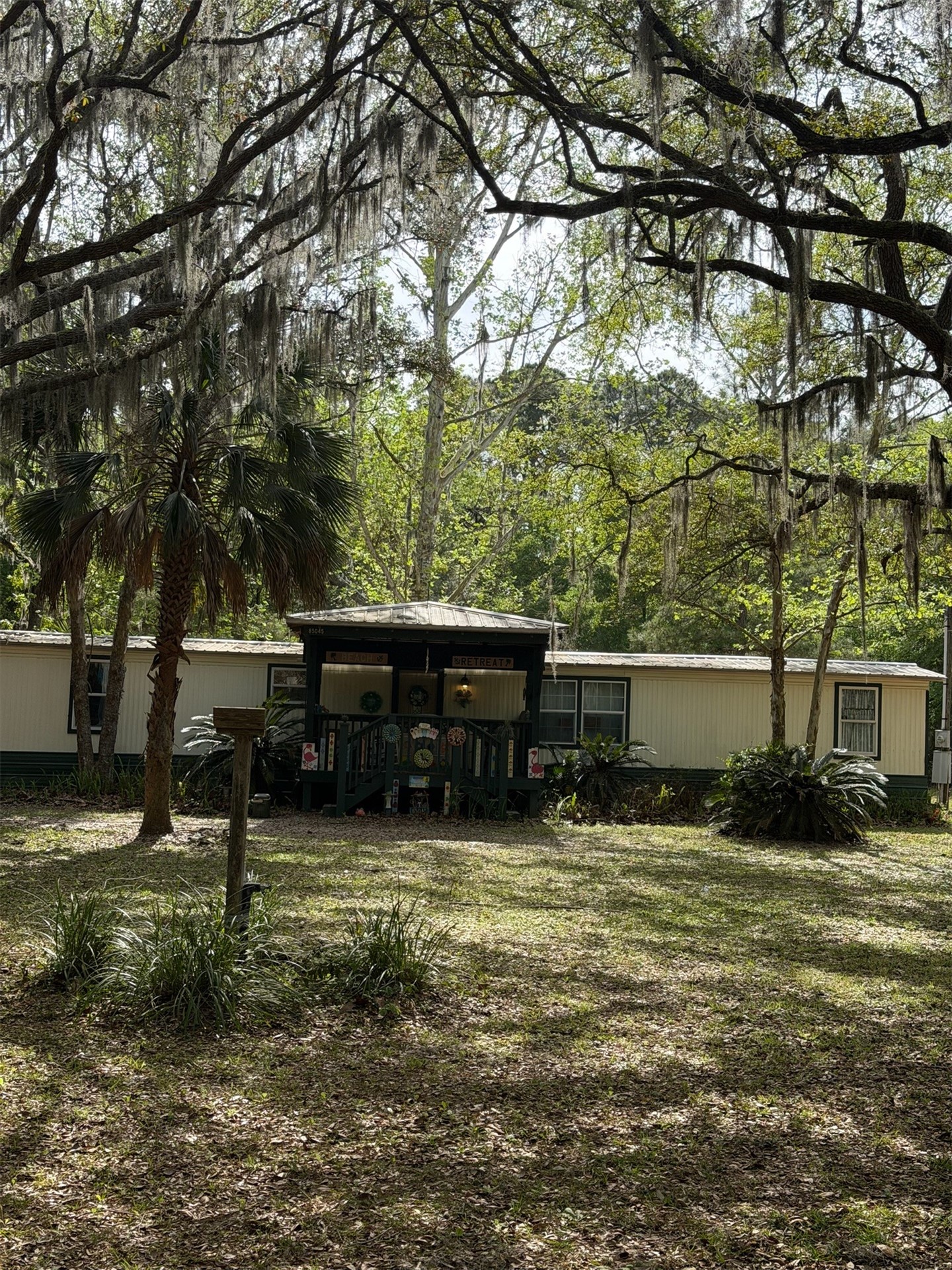 85045 Lonnie Crews Road Fernandina Beach, FL 32034 - Photo 28 of 28 a view of house with yard in front of it