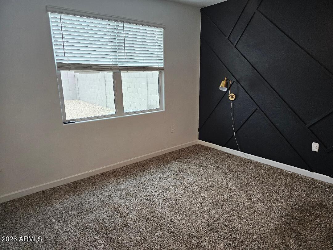 24151 West Ripple Road Buckeye, AZ 85326 - Photo 6 of 13 a view of empty room with window