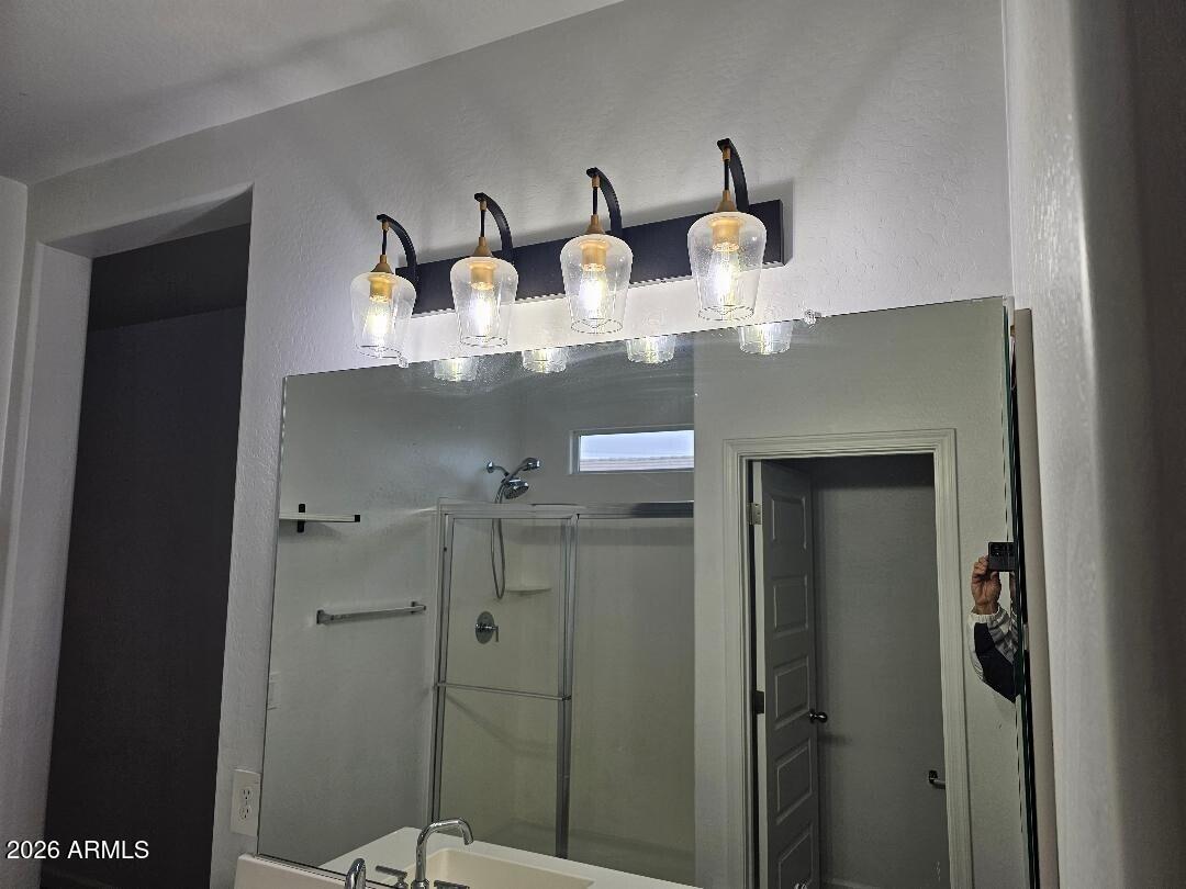 24151 West Ripple Road Buckeye, AZ 85326 - Photo 7 of 13 a close view of light fixtures