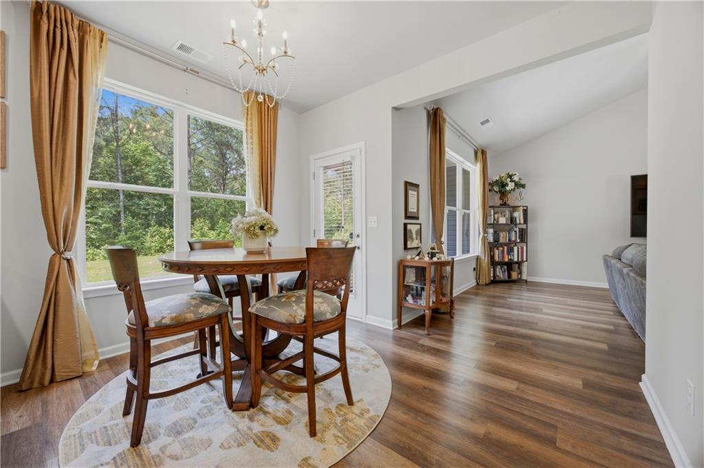 70 Gold Mine Road Grantville, GA 30220 - Photo 6 of 23 a view of a dining room with furniture window and wooden floor