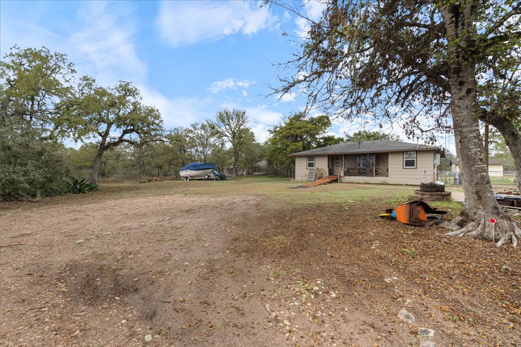 250 Rick Road La Grange, TX 78945 - Photo 11 of 27 a view of a house with a yard