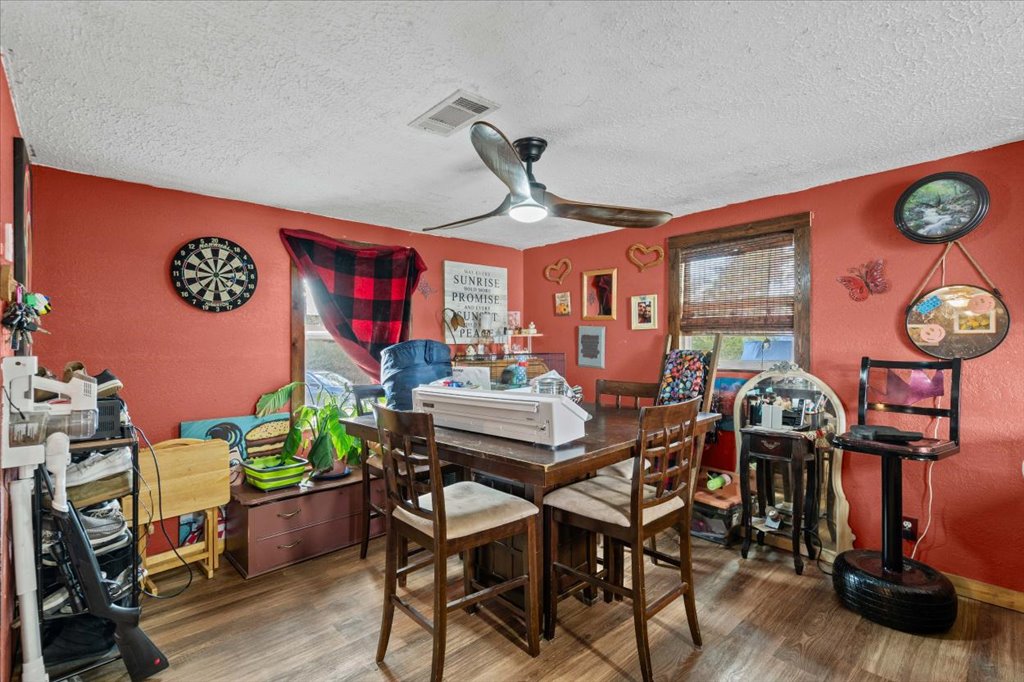 250 Rick Road La Grange, TX 78945 - Photo 20 of 27 a view of a dining room with furniture and chandelier