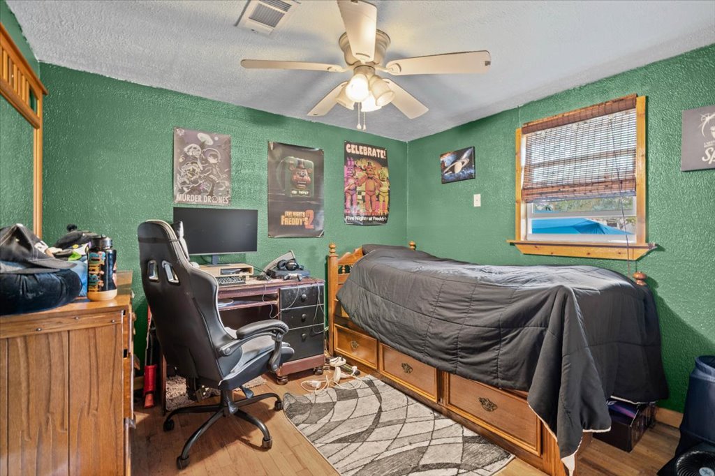 250 Rick Road La Grange, TX 78945 - Photo 23 of 27 a bedroom with a workspace