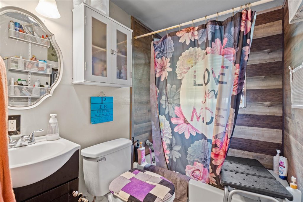 250 Rick Road La Grange, TX 78945 - Photo 24 of 27 a bathroom with a sink toilet and shower