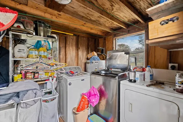 a storage room with washer and dryer