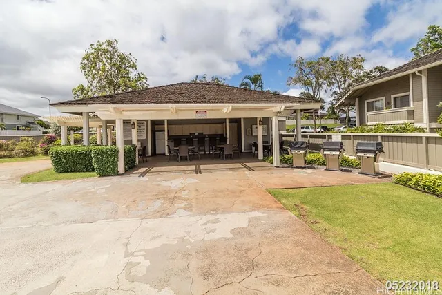 a view of a house with sitting area