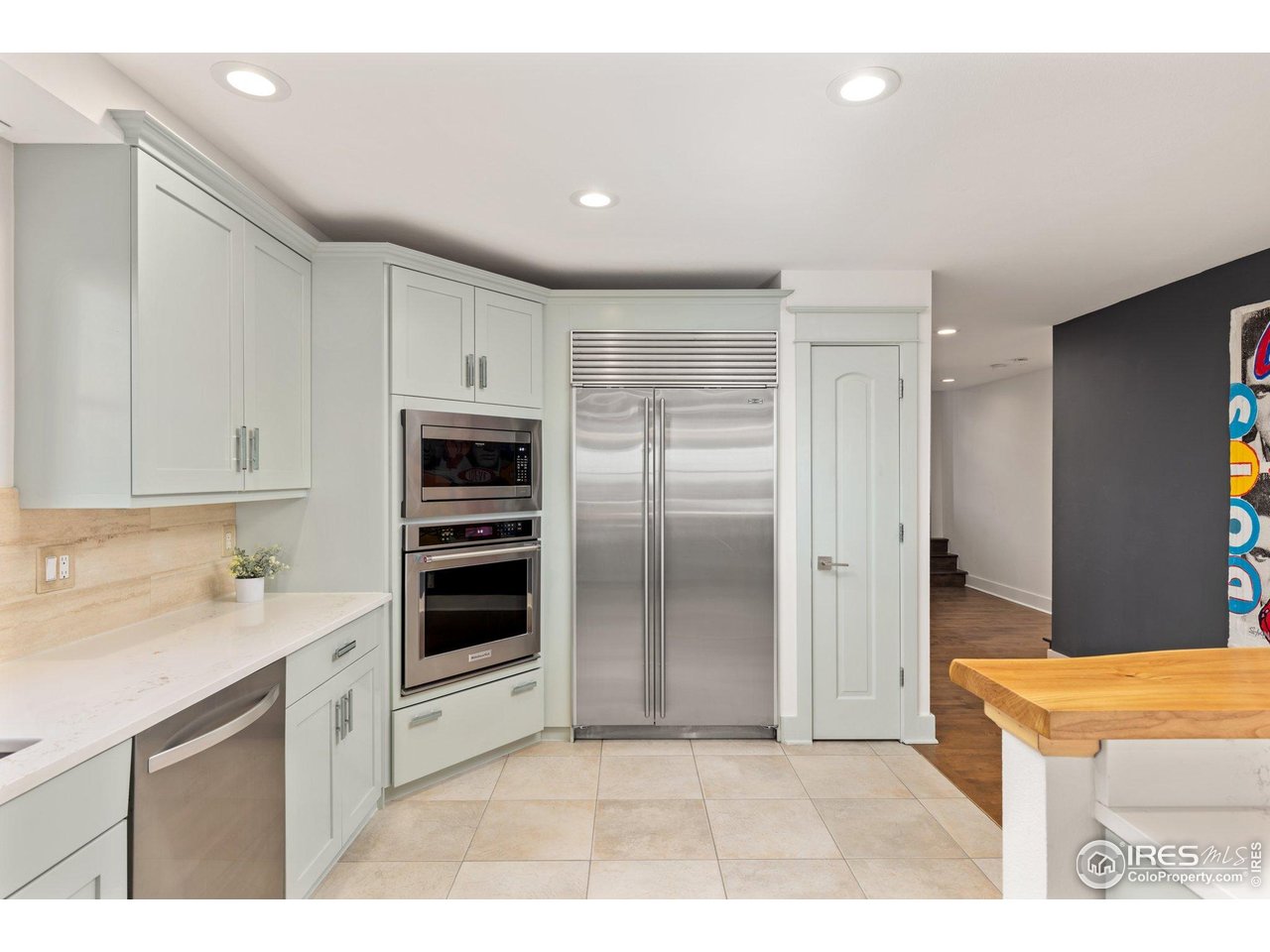 2942 4th Street Boulder, CO 80304 - Photo 15 of 40 a kitchen with a refrigerator and a sink