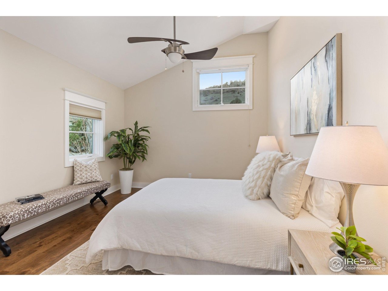 2942 4th Street Boulder, CO 80304 - Photo 21 of 40 a bedroom with a bed potted plant with the dresser