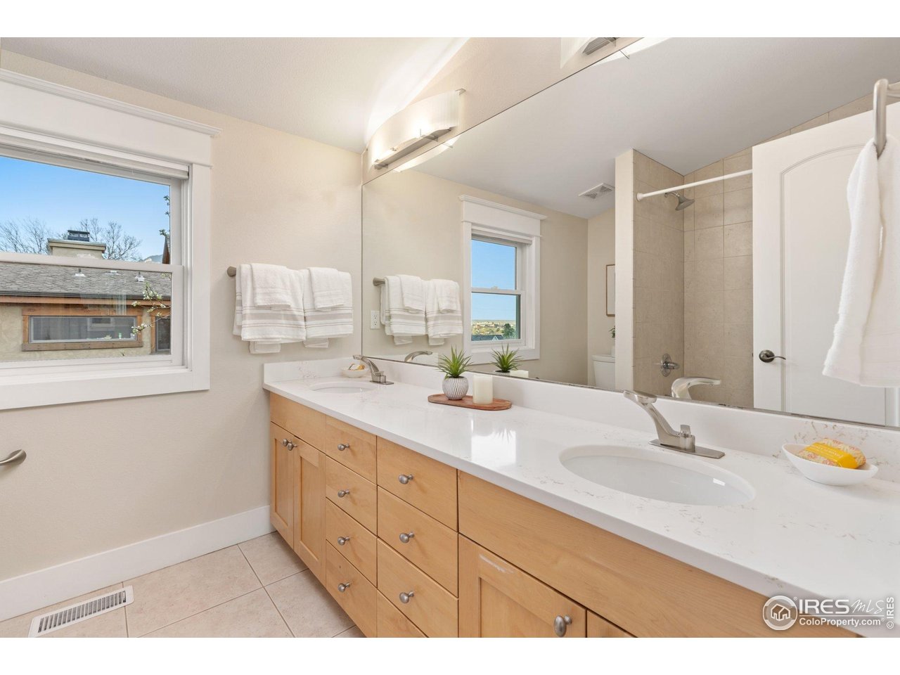 2942 4th Street Boulder, CO 80304 - Photo 23 of 40 a bathroom with a sink and a mirror