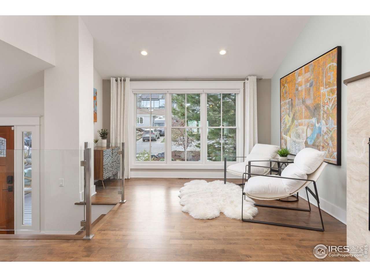 2942 4th Street Boulder, CO 80304 - Photo 8 of 40 a living room with furniture and a large window
