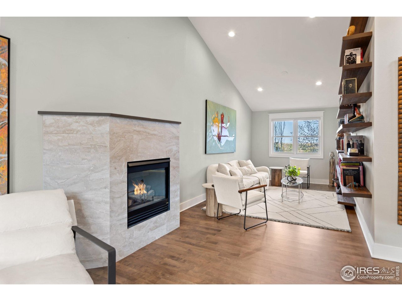 2942 4th Street Boulder, CO 80304 - Photo 9 of 40 a living room with furniture and a fireplace