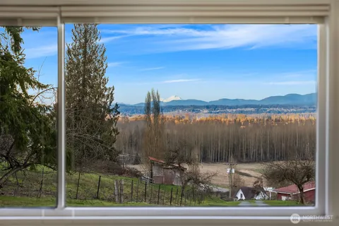 a view of a lake from a balcony