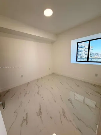 an empty room with a window