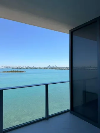 a large room with wooden cabinets