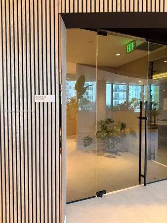 a view of two chair near the water