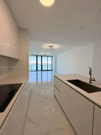 a hallway with a large window