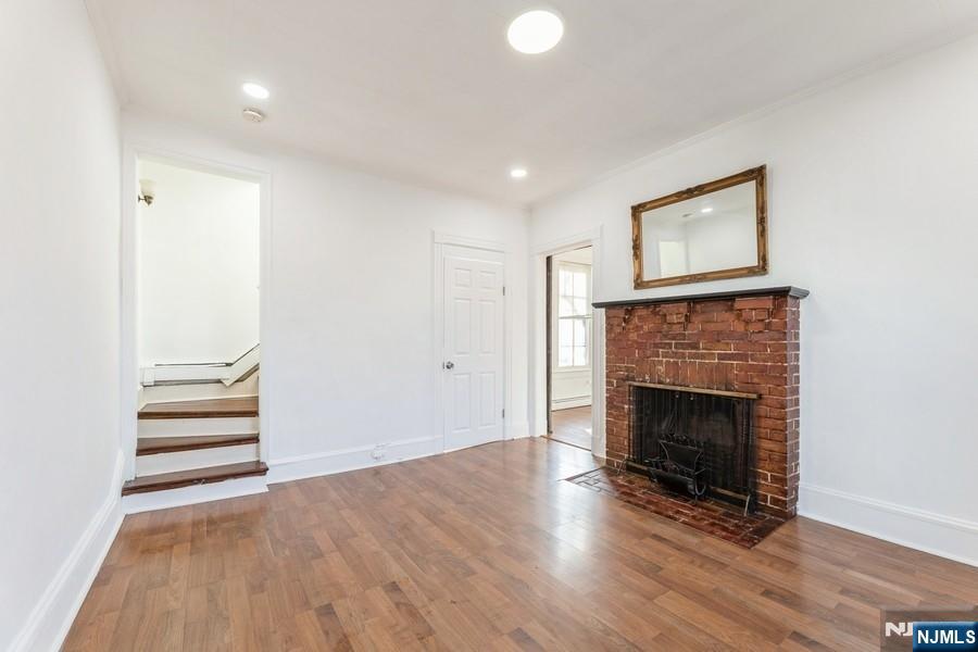 21 Central Avenue Tenafly, NJ 07670 - Photo 3 of 22 a view of a livingroom with a fireplace