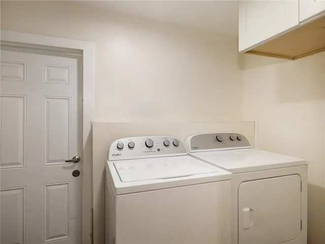 a view of a backyard with a patio