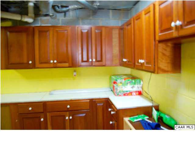 2205 Ridgeway Lane Charlottesville, VA 22911 - Photo 23 of 32 Great cabinetry and counter space in laundry room. This room has loads of options for expansion.