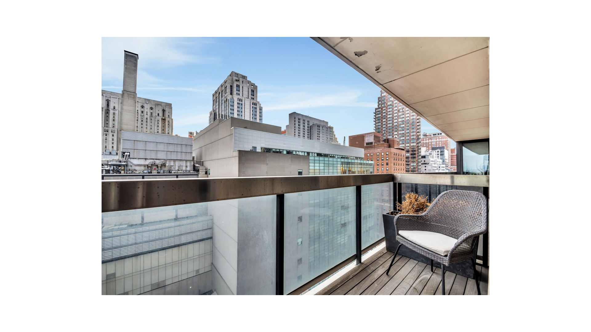 515 East 72nd Street, Unit 15D Manhattan, NY 10021 - Photo 2 of 10 a upper view of living room with furniture and window