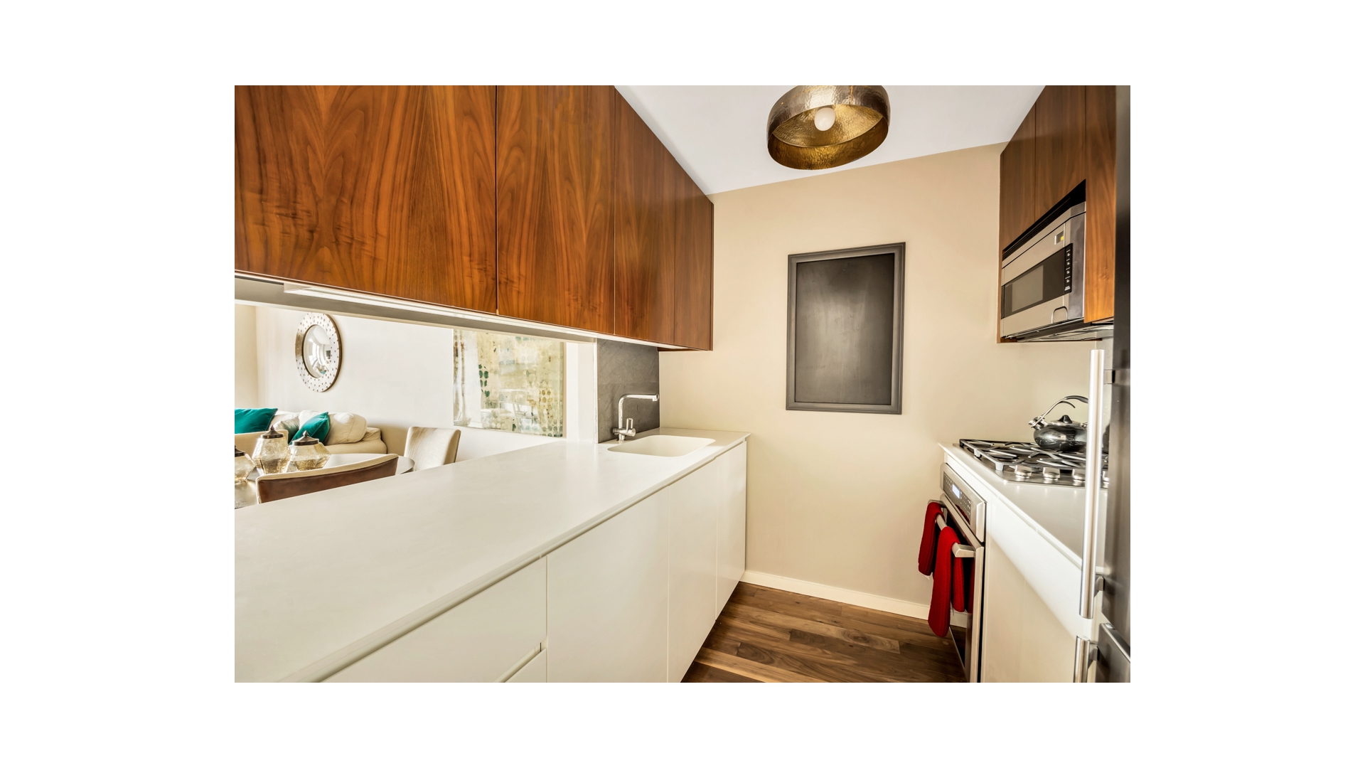 515 East 72nd Street, Unit 15D Manhattan, NY 10021 - Photo 5 of 10 a utility room with sink dryer and washer