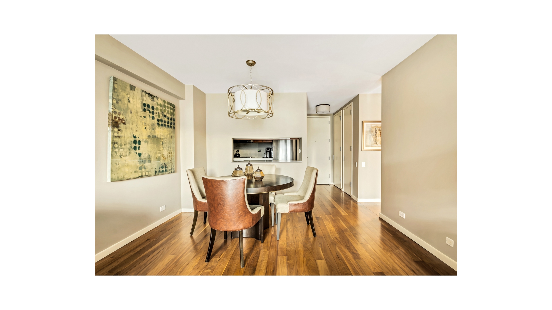 515 East 72nd Street, Unit 15D Manhattan, NY 10021 - Photo 6 of 10 a dining room with furniture and wooden floor