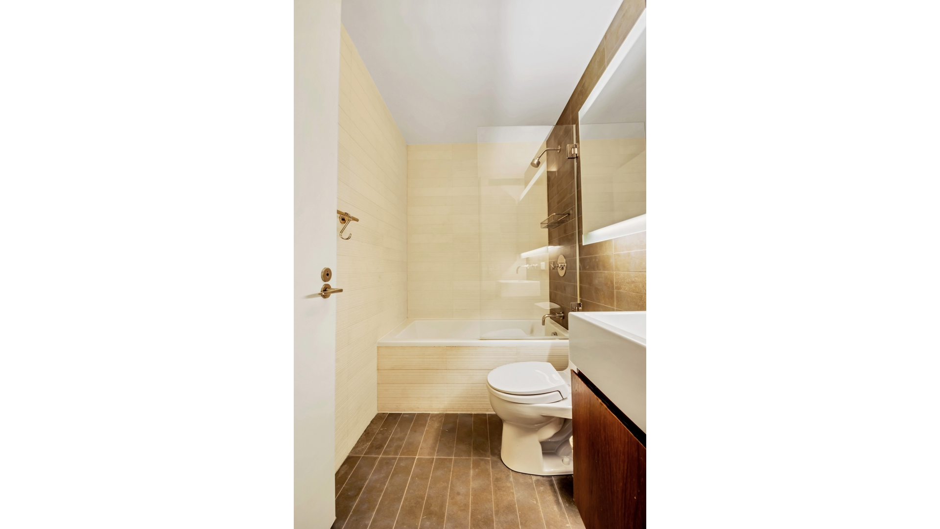515 East 72nd Street, Unit 15D Manhattan, NY 10021 - Photo 9 of 10 a bathroom with a toilet and a shower
