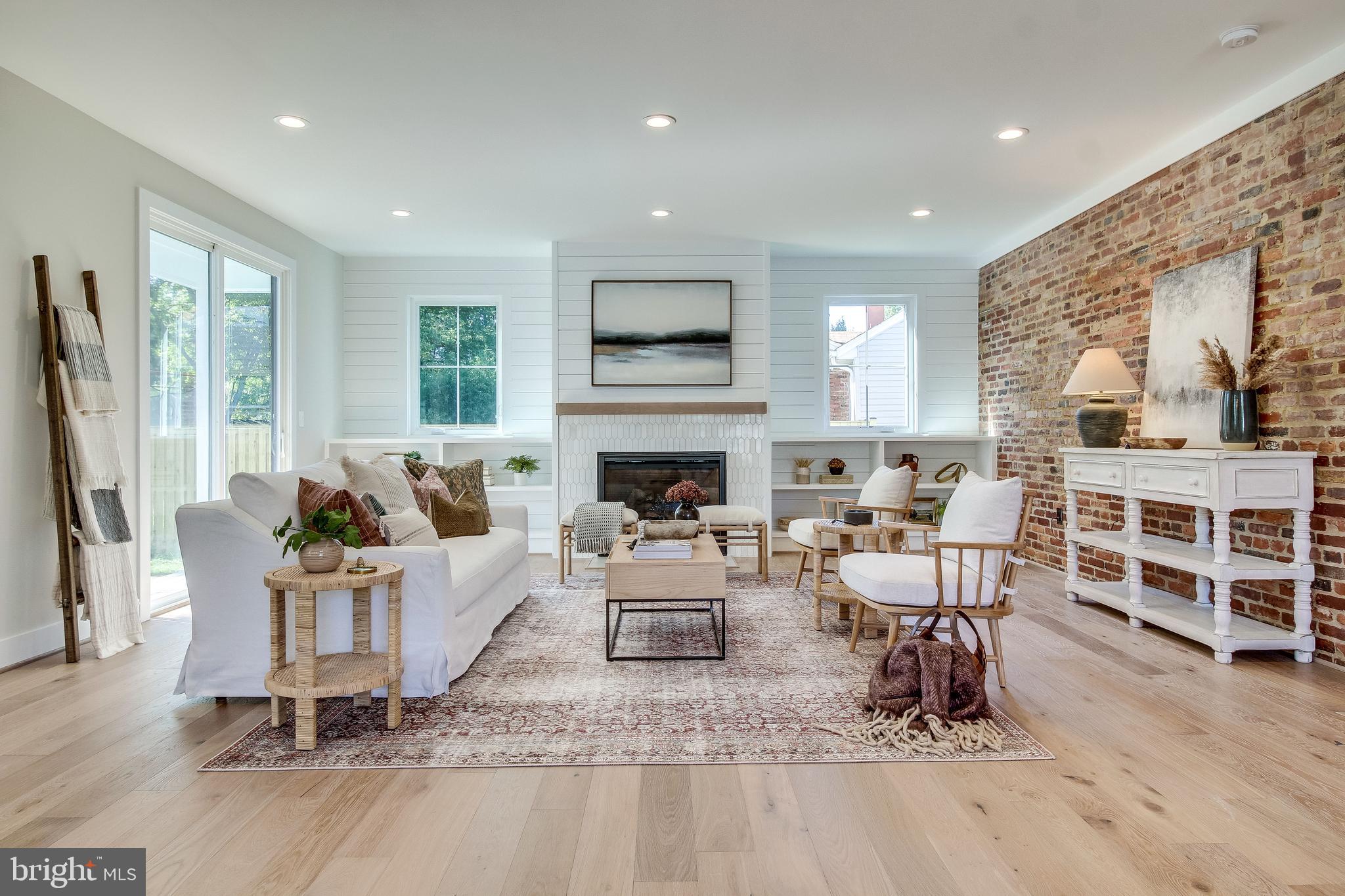 1609 Shenandoah Road Alexandria, VA 22308 - Photo 30 of 102 Exposed brick wall & gas fireplace