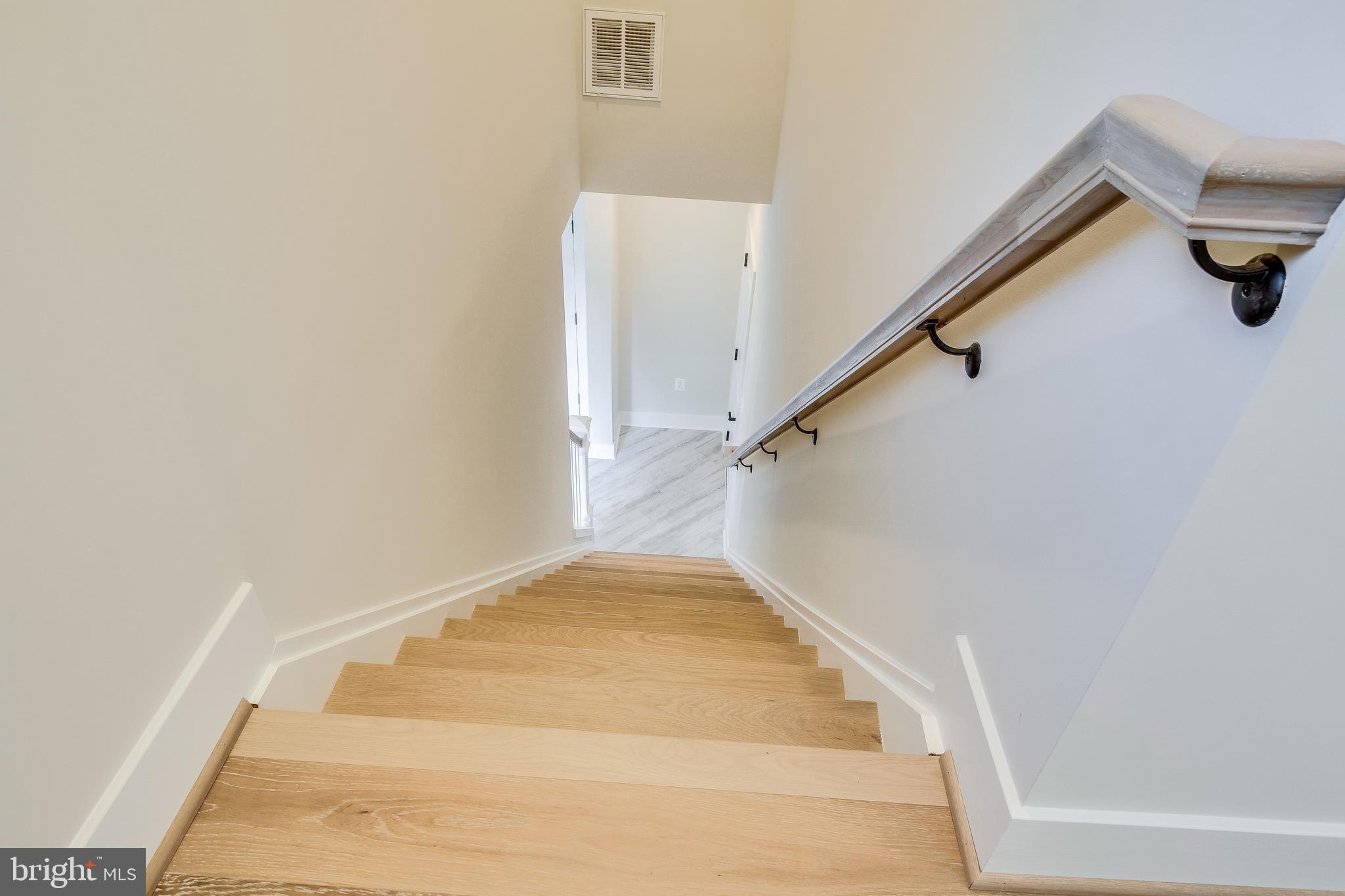 1609 Shenandoah Road Alexandria, VA 22308 - Photo 38 of 102 Staircase from mudroom to bonus room above garage