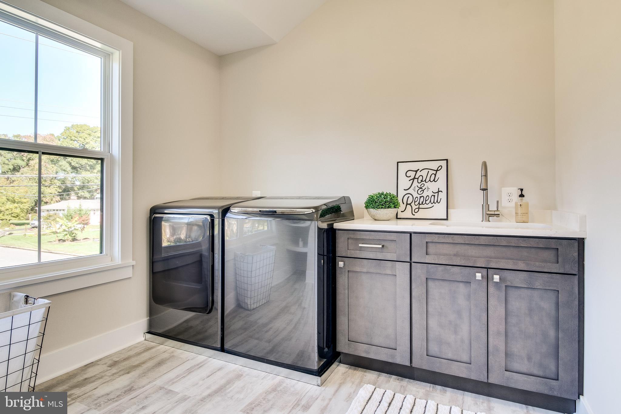 1609 Shenandoah Road Alexandria, VA 22308 - Photo 48 of 102 Laundry room w/ plenty of cabinet storage