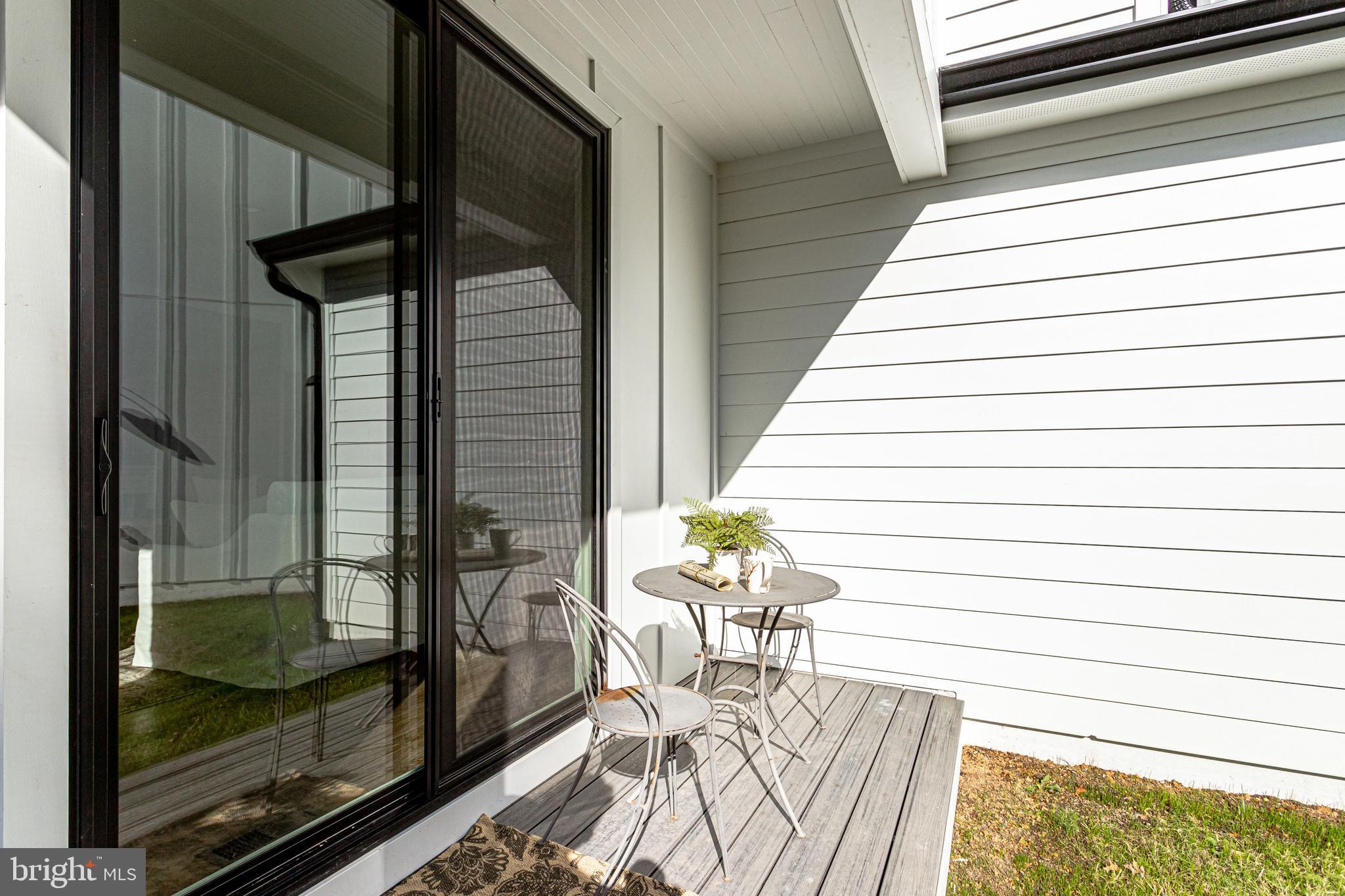 1609 Shenandoah Road Alexandria, VA 22308 - Photo 91 of 102 Sliding glass doors to porch off family room