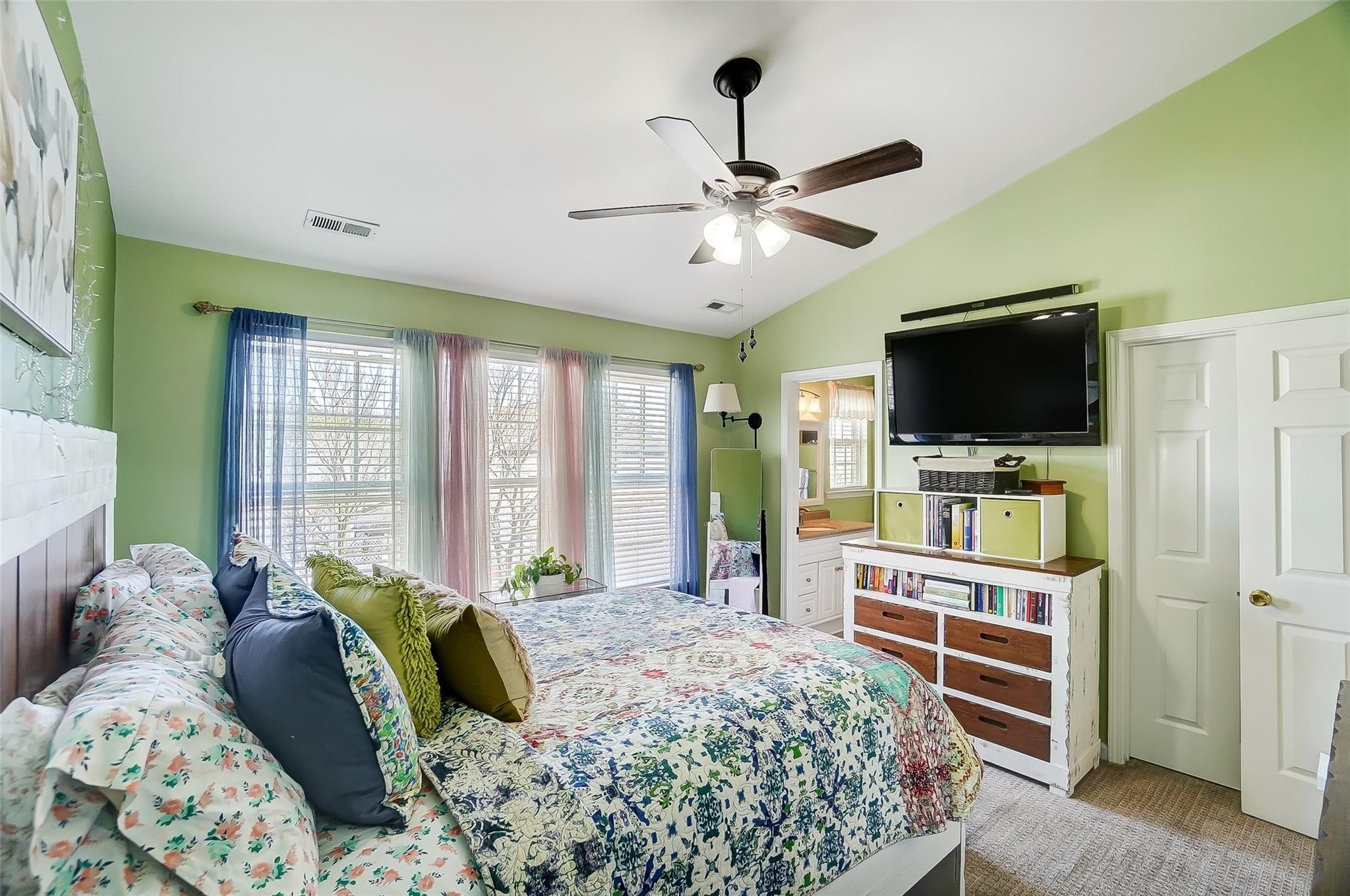 753 Shellstone Place, Unit 87 Fort Mill, SC 29708 - Photo 12 of 21 a bed room with a bed television and a large window