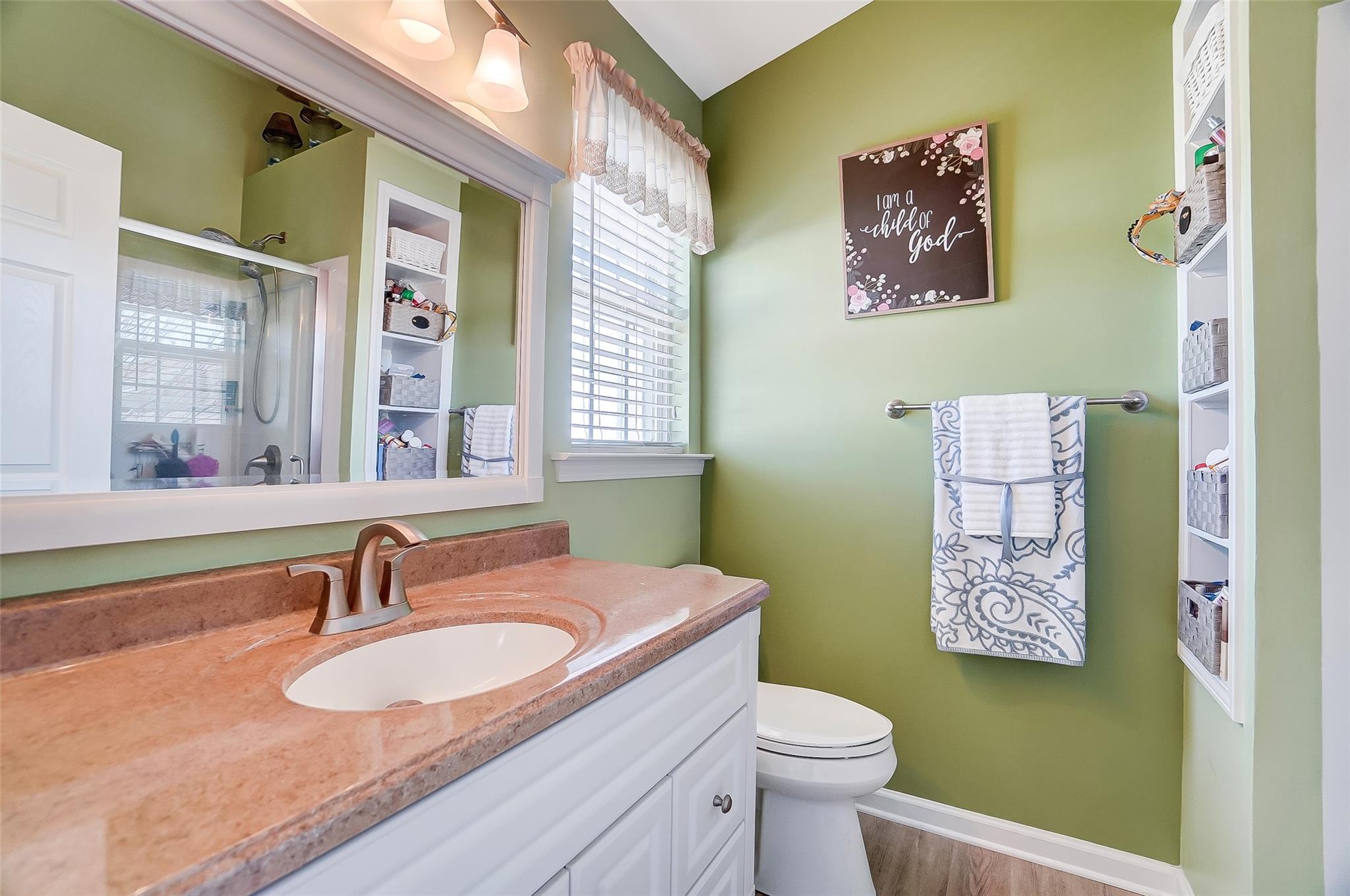 753 Shellstone Place, Unit 87 Fort Mill, SC 29708 - Photo 13 of 21 a bathroom with a sink a toilet and a window