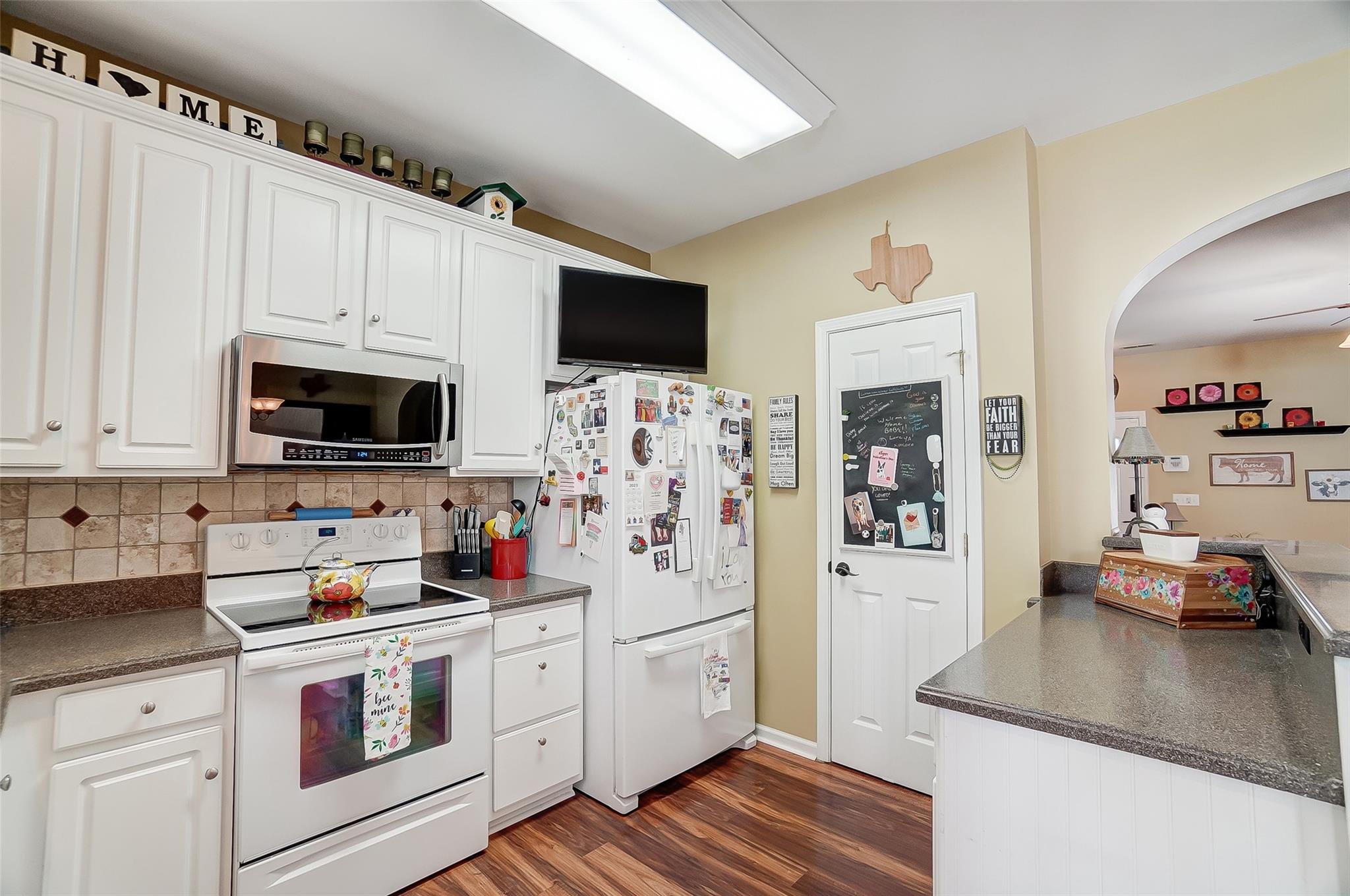 753 Shellstone Place, Unit 87 Fort Mill, SC 29708 - Photo 8 of 21 a kitchen with stainless steel appliances a stove microwave and refrigerator