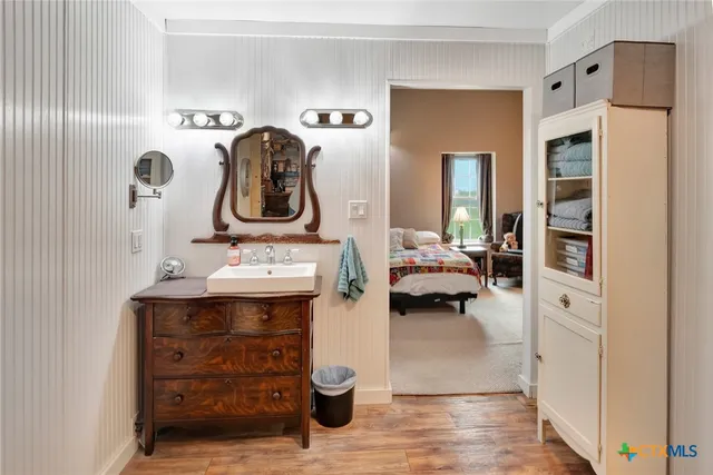 a view of living room with furniture and white walls