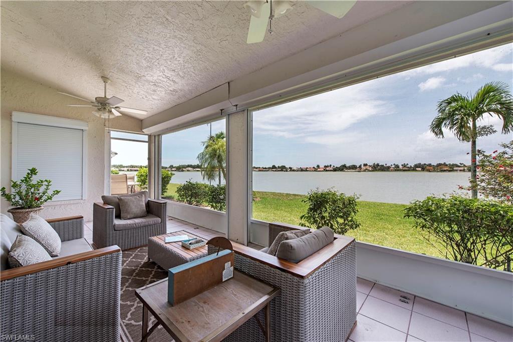 7271 Mill Pond Circle Naples, FL 34109 - Photo 17 of 45 a living room with patio and furniture