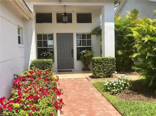 a front view of a house with a porch