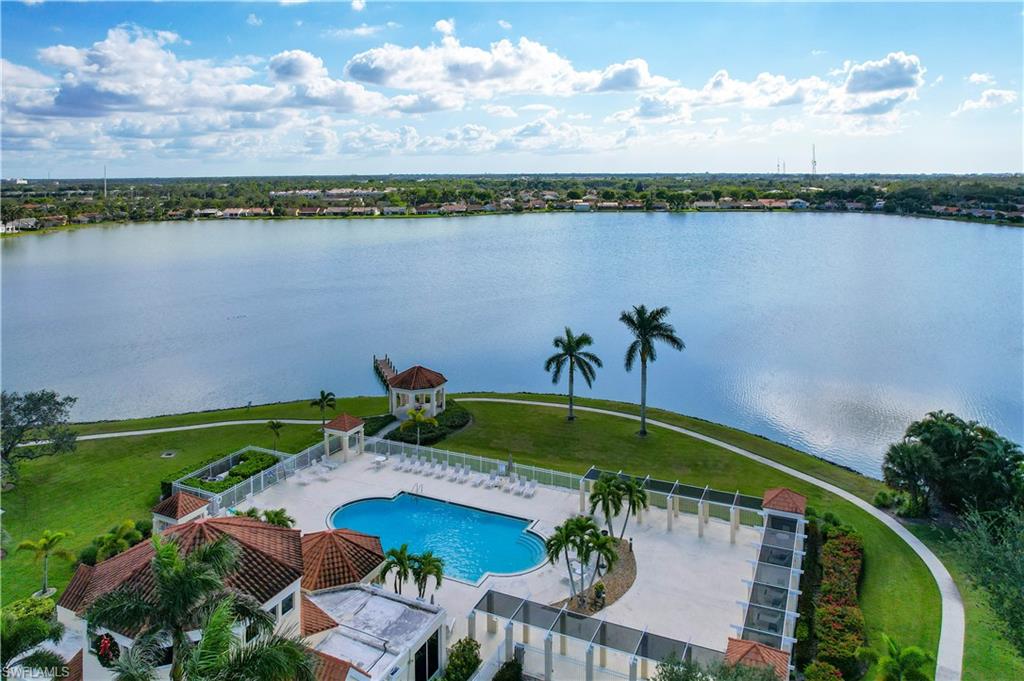 7271 Mill Pond Circle Naples, FL 34109 - Photo 23 of 45 an aerial view of a house with a lake view