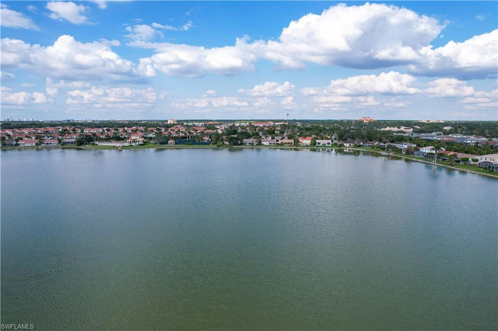 7271 Mill Pond Circle Naples, FL 34109 - Photo 24 of 45 an aerial view of a city