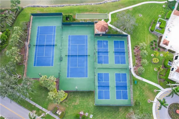 a view of an outdoor space and tennis court