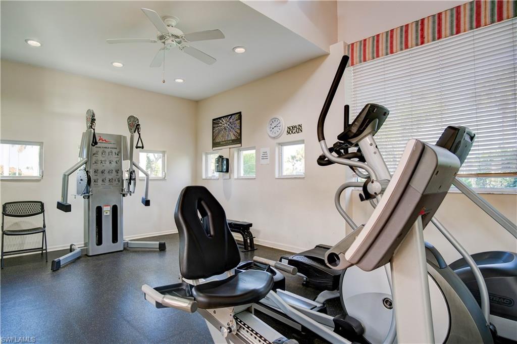 7271 Mill Pond Circle Naples, FL 34109 - Photo 32 of 45 a view of a room with gym equipment