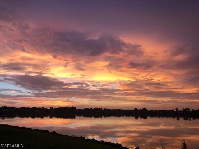 7271 Mill Pond Circle Naples, FL 34109 - Photo 4 of 45 a view of city and lake