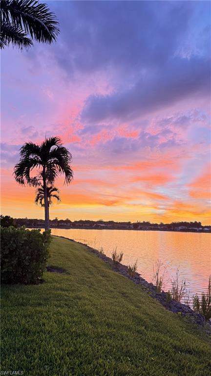 7271 Mill Pond Circle Naples, FL 34109 - Photo 42 of 45 a view of an ocean and beach