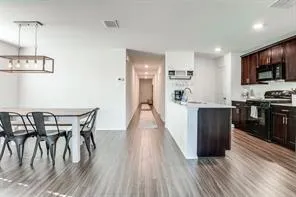 a view of a kitchen from the kitchen