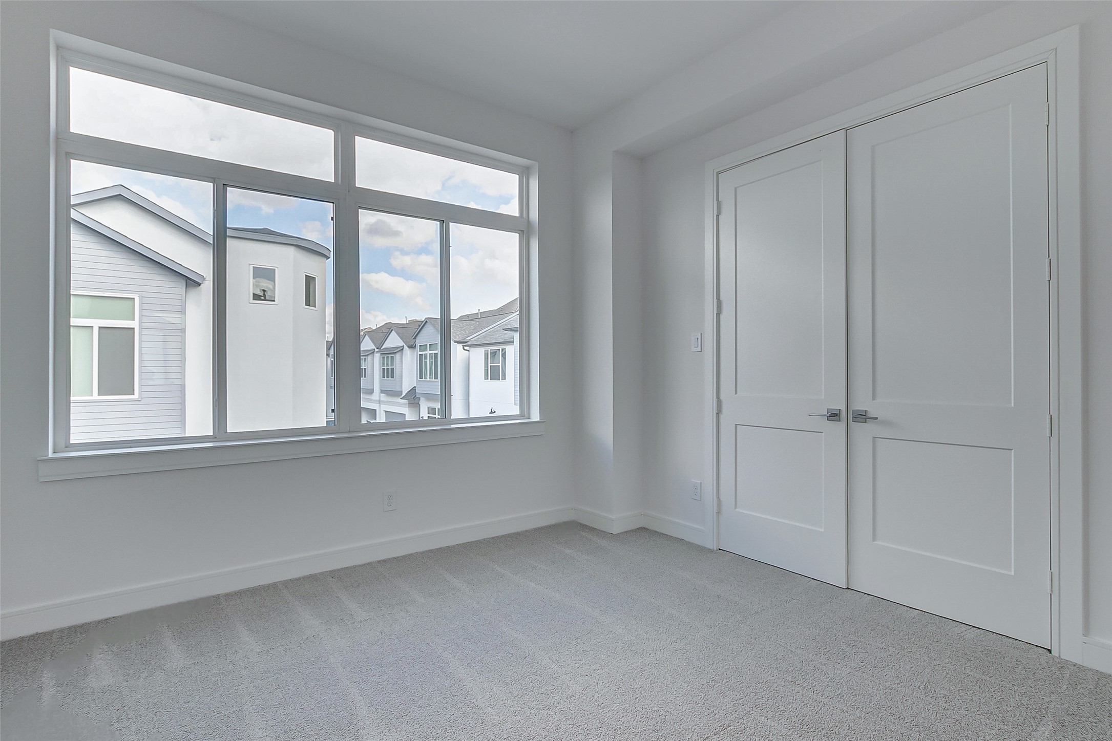 8926 Spring Knoll Forest Drive Houston, TX 77080 - Photo 11 of 22 a view of an empty room with a window