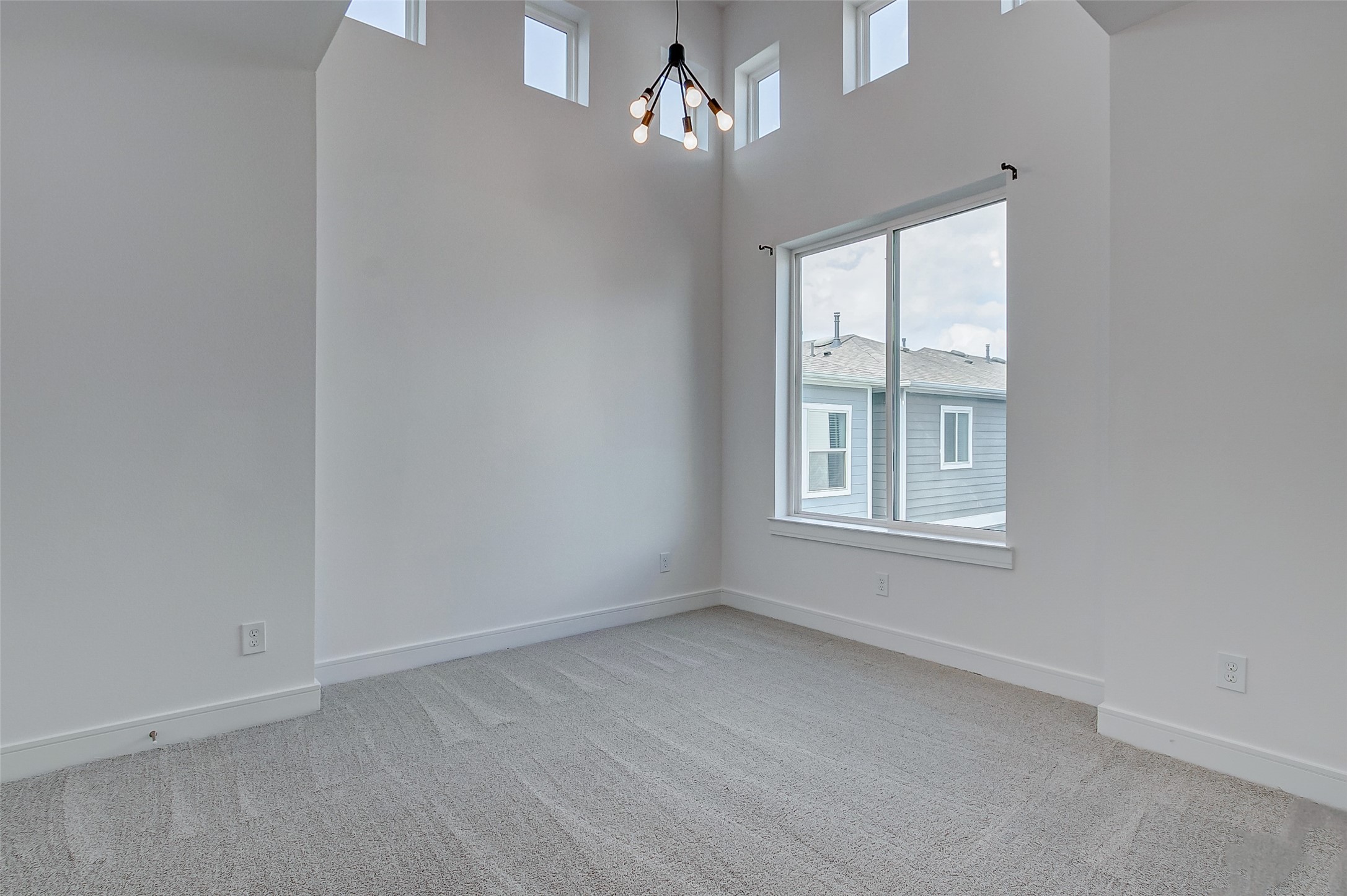 8926 Spring Knoll Forest Drive Houston, TX 77080 - Photo 12 of 22 an empty room with a window
