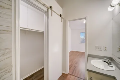 a bathroom with a sink and a mirror