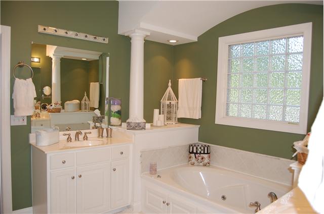 2007 Tamara Court Springfield, TN 37172 - Photo 14 of 20 Master bath is very large and has 2 separate vanities(one on each side of tub), whirlpool with custom column/arch above. There is a large separate shower as well. Toilet room is separate. An extra large master closet opens up from the master bath.