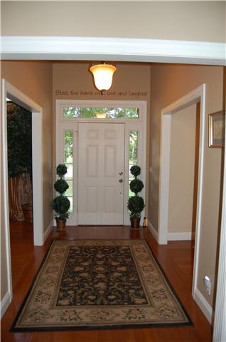 2007 Tamara Court Springfield, TN 37172 - Photo 2 of 20 Walk into the stately foyer with tall ceiling and hardwood flooring. Dining room and office open up on either side of foyer. There is a 1/2 bath by office as well.